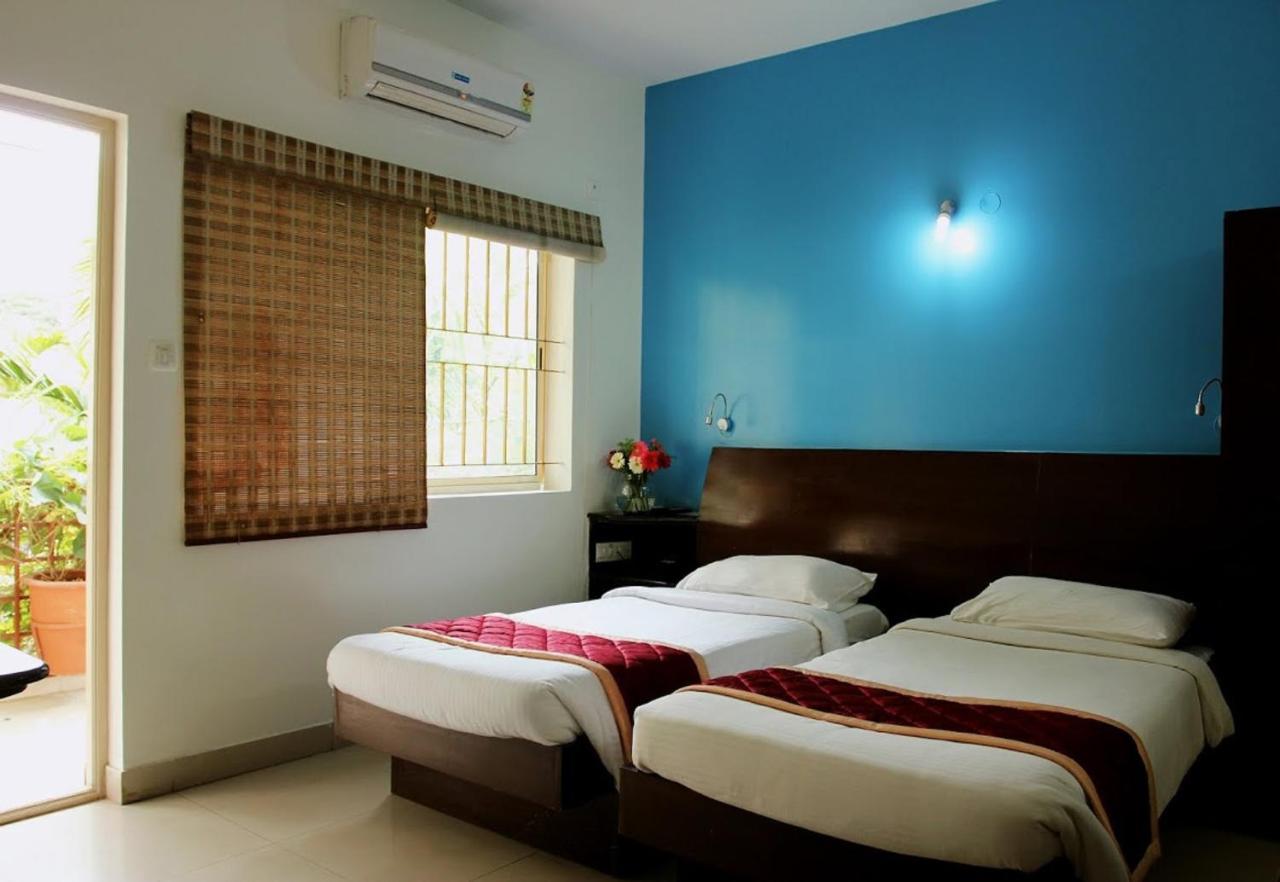 The Green Path Eco Hotel Bangalore Bagian luar foto