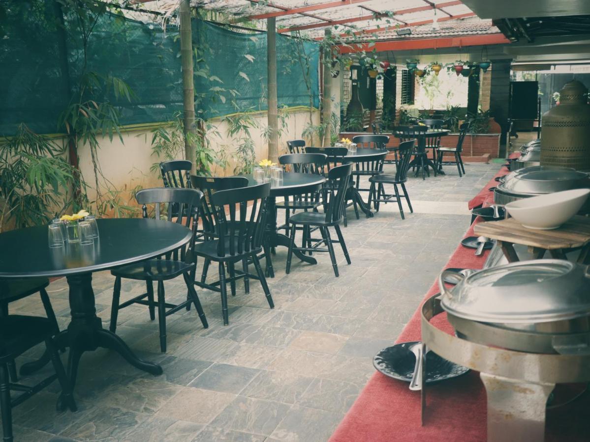 The Green Path Eco Hotel Bangalore Bagian luar foto