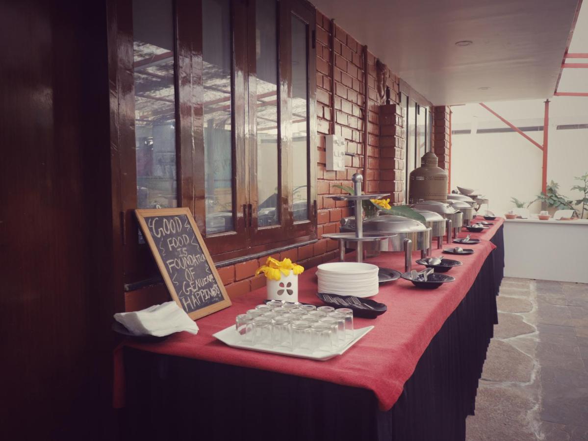 The Green Path Eco Hotel Bangalore Bagian luar foto